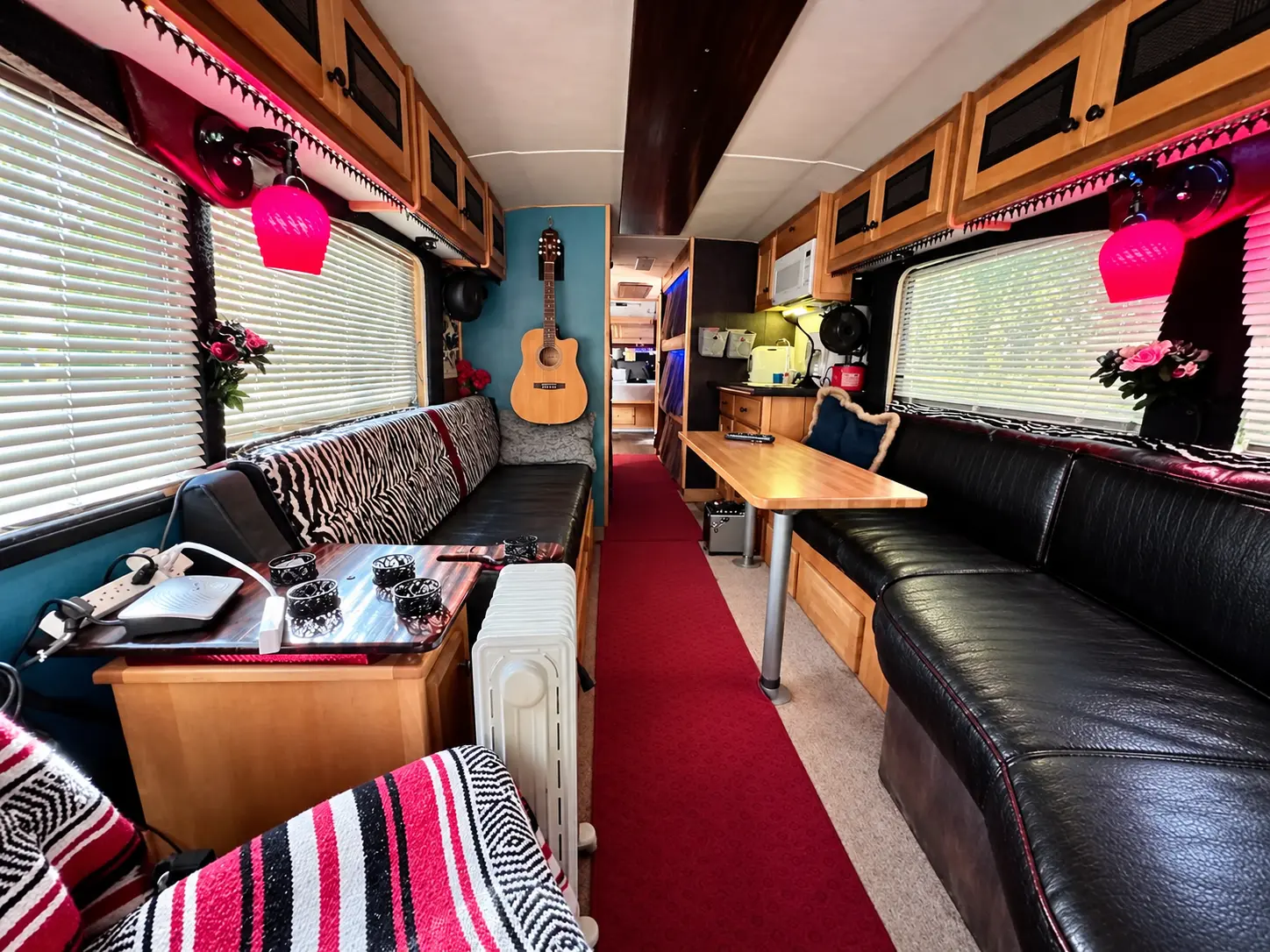 Full view through the lounge inside the vintage Eagle tour bus
